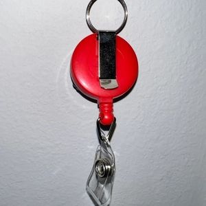 Retractable reel id badge holder
